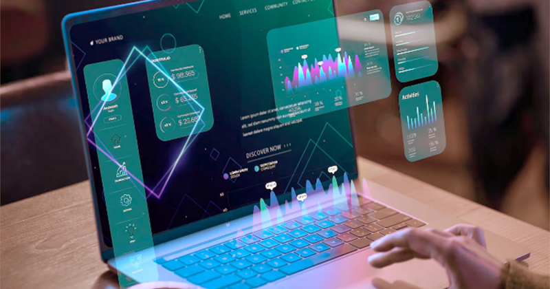 Tela de um notebook com elementos gráficos saindo da tela