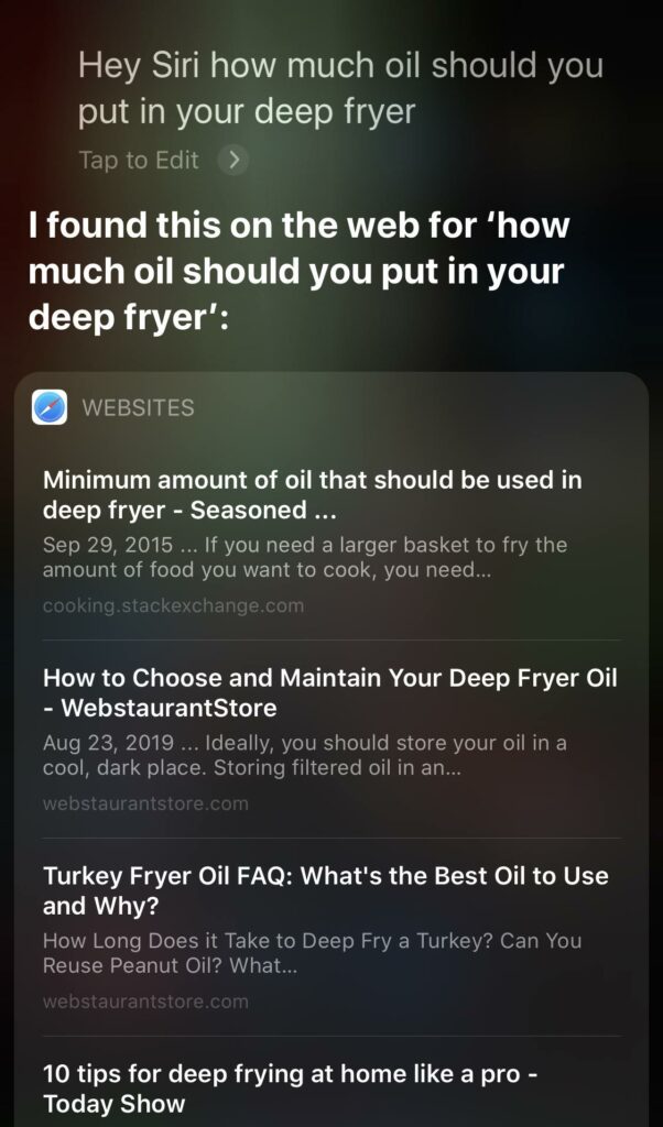 Uma captura de tela de uma pesquisa de voz Siri com resultados