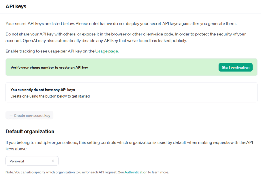 Página de chaves da API OpenAI mostrando opções para verificar um número de telefone, criar uma nova chave secreta e definir uma organização padrão.